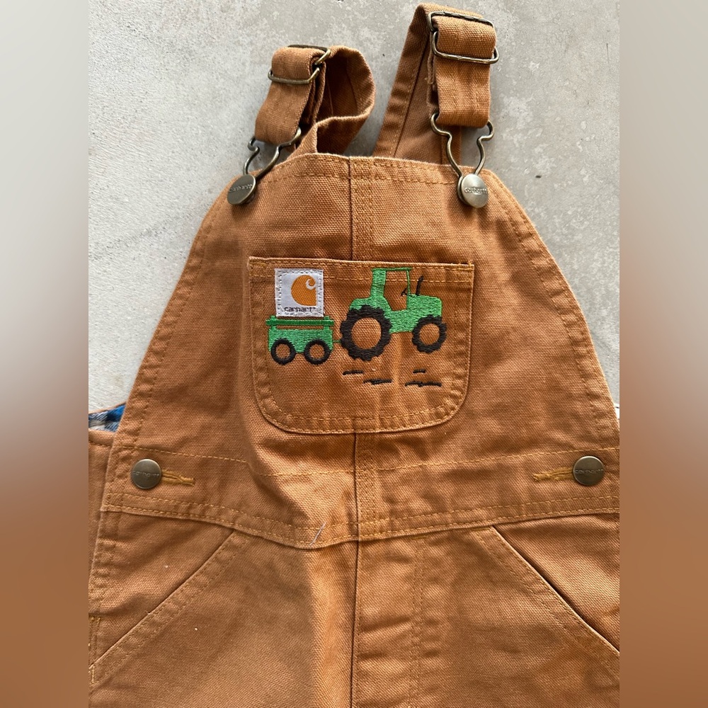 New with tags - embroidered tractor Carhartt bibs
